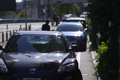 Close-up of traffic on road in city