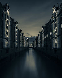 Illuminated buildings in city at night