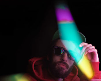 Portrait of young man wearing sunglasses