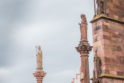 Low angle view of statue against sky