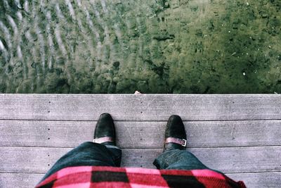 Low section of person standing on ground