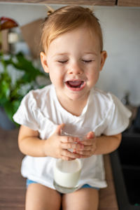 Portrait of cute baby boy at home