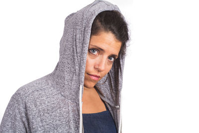 Portrait of woman against white background