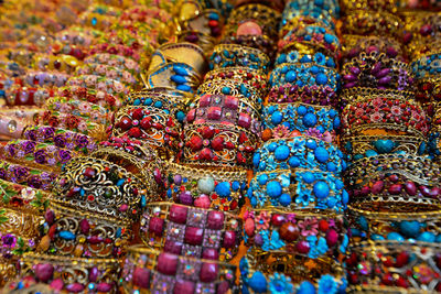Uighur women's traditional and colorful bracelet jewelry on a vendor in the grand bazaar