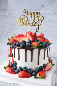 Various fruits on cake