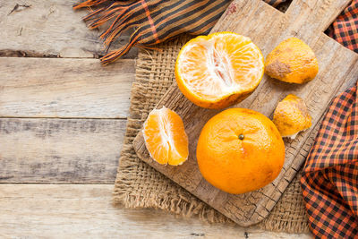 High angle view of orange fruits on table