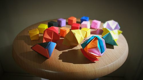 Close-up of paper cuttings on table