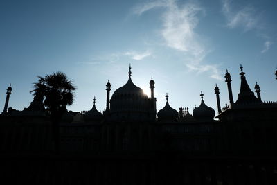 Low angle view of mosque against sky