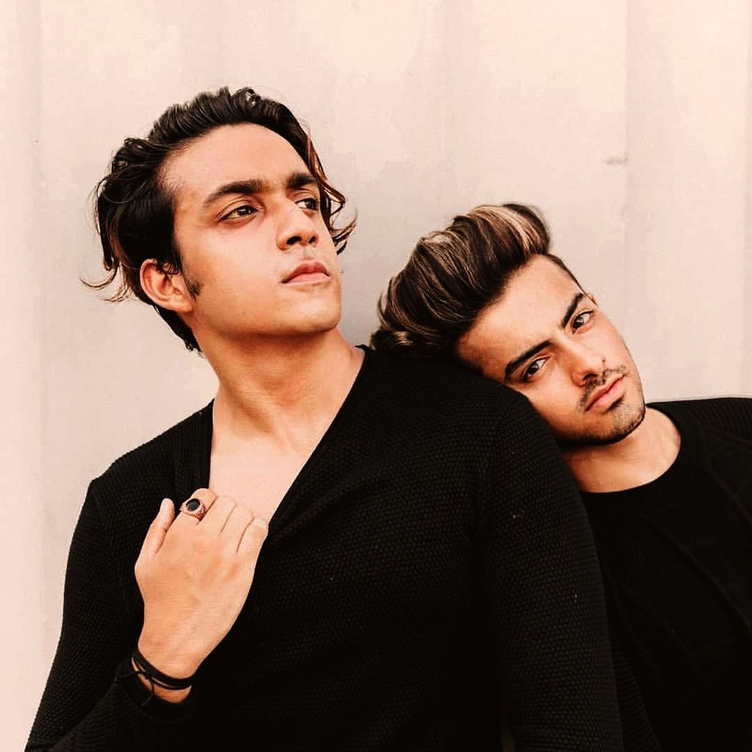 young adult, two people, young men, couple - relationship, indoors, portrait, real people, lifestyles, heterosexual couple, people, young couple, men, waist up, young women, adult, togetherness, emotion, looking away, women, contemplation