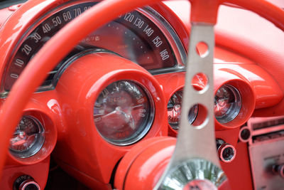 Close-up of red vintage car