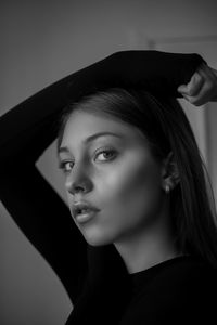 Portrait of young woman looking away