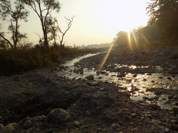 Scenic view of landscape against sky during sunset