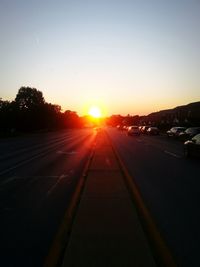 Sunset over road