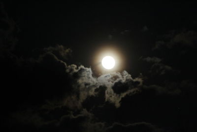 Low angle view of moon in sky at night