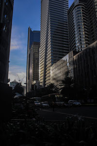 Modern buildings in city against sky