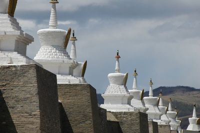 Built structure against cloudy sky