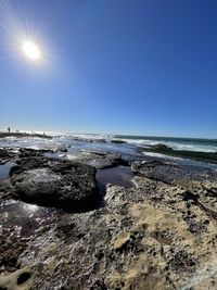 Scenic view of sea against clear sky