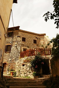 Low angle view of old building against sky