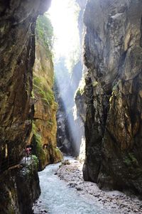 Scenic view of waterfall amidst rocks