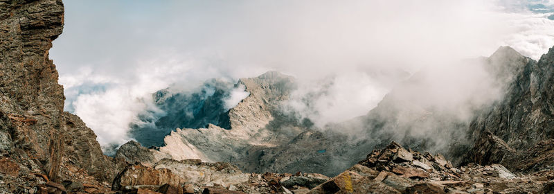 Panoramic view of landscape and mountains against sky