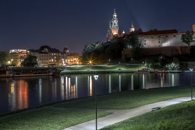 Wawel castle and vistula, wisla, river night panorama, krakow, poland