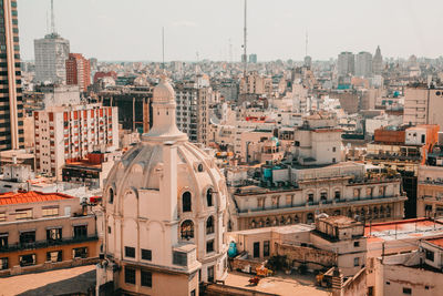 Cathedral in city against sky