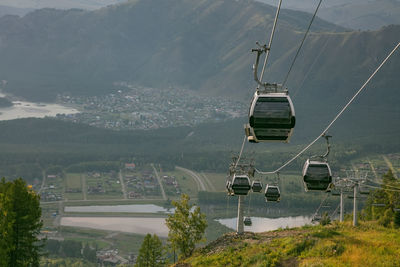 High angle view of overhead cable car over mountains