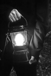 Close-up of hands holding fire