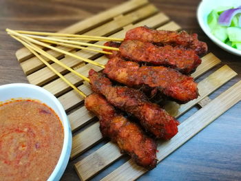 Close-up of meat on barbecue grill