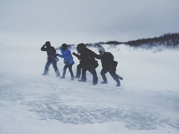 Friends jumping in the sky