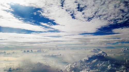 Scenic view of landscape against cloudy sky