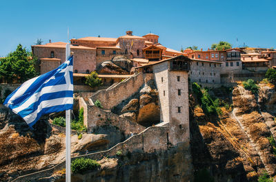 Low angle view of built structure against clear blue sky