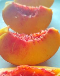 Close-up of orange slice on table