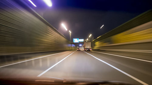 Light trails on road at night