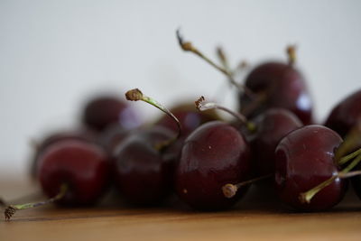 Close-up of grapes on table