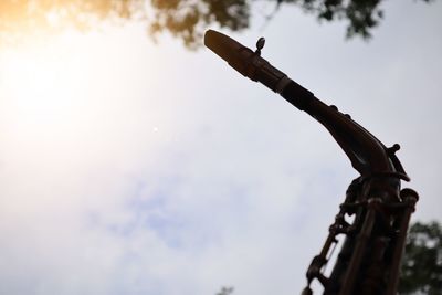 Low angle view of metallic structure against sky