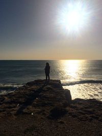 Silhouette of people on beach