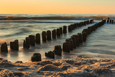 Scenic view of sea against sky during sunset