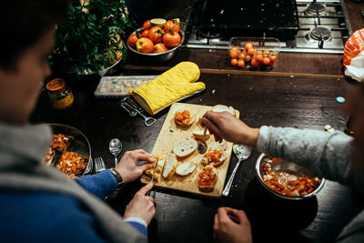 High angle view of woman eating food