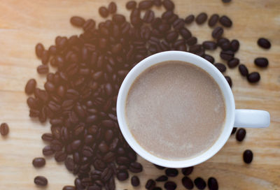 High angle view of coffee cup on table