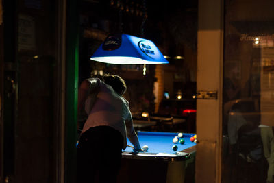 View of illuminated people at night