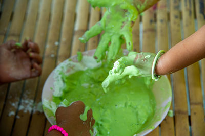 Close-up of hand holding ice cream