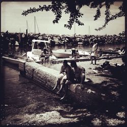 Full length of woman standing on bench