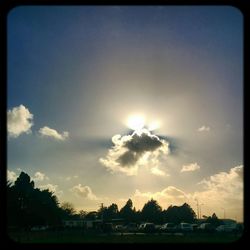 Sun shining through clouds