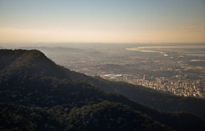 High angle view of city against sky during sunset