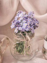 Close-up of flowers in vase on table