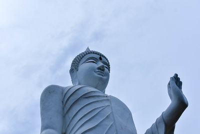 Low angle view of statue against sky