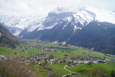 Scenic view of landscape and mountains against sky