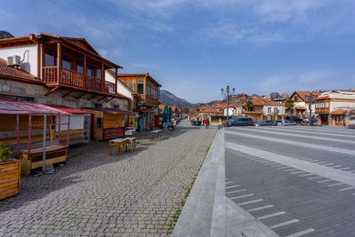 Buildings in city against sky