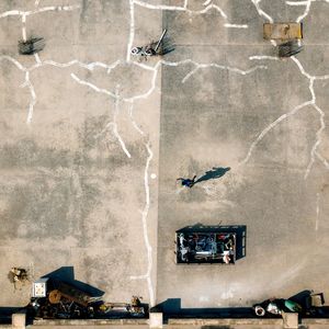 Directly above shot of man walking on land